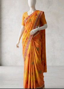 Vibrant Orange Saree with Geometric Print