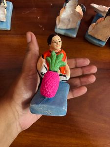 Clay dolls for jhulon decoration