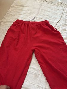 Red Track Pants with White Stripes