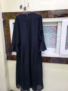 Elegant Black Ruffled Gown