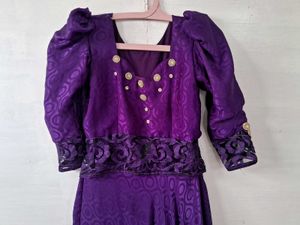 Elegant Purple Brocade Gown with Gold Accents
