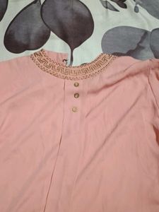 Elegant Peach top with Embellished Neckline