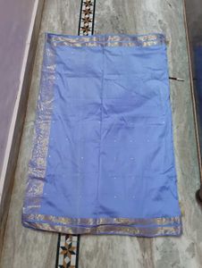 Elegant Blue Saree with Gold Border