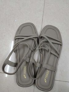 A khaki coloured women sandals