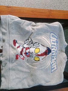 Grey Varsity Jacket.Waist 30 inch, Length 15 inch.