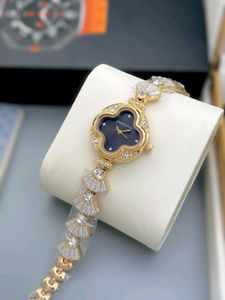 louis vuitton diamond studded ladies watch