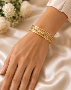Elegant Gold Tone Bracelet with Crystals
