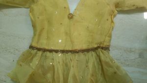 Mustard Yellow Peplum Lehenga Choli with Net Dupat