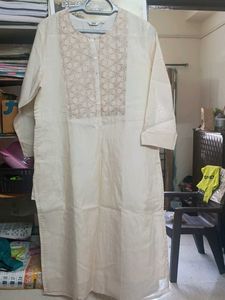 Elegant Cream Kurta with Intricate Neckline
