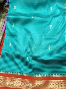 Elegant Teal Saree with Gold Motifs