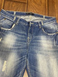 Evan London Distressed Denim Jeans