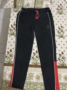 Puma Black Track Pants with Red Stripe