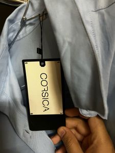 Light Blue Button-Down Shirt ( size - M)