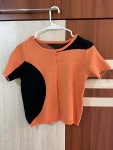 Orange & Black Color Block Knit Top