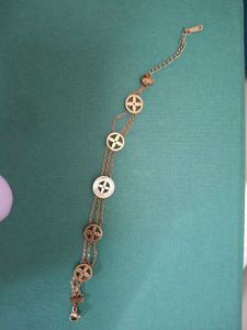 Elegant Gold Bracelet with Charm