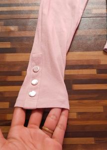 Peach Full-Sleeve Bodysuit by Amisu