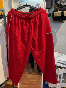 Red Sweatpants with White Stripe
