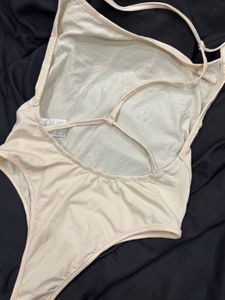Creamy One-Piece Bodysuit