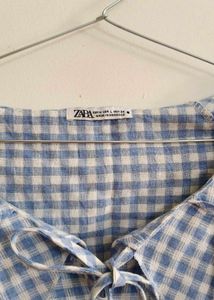 Blue Gingham Ruffle Neck Top