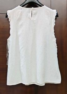 Elegant Sleeveless Cream Top