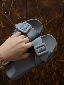 Stylish Grey Slide Sandals with Buckle Detail