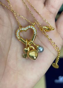 100%OG pendant with packaging
