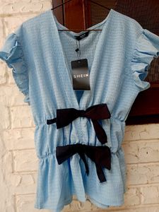 Cute Blue Smocked Top with Bows