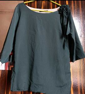 Elegant Green Top with Floral Detail