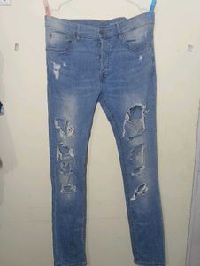 Distressed Blue Denim Jeans with top