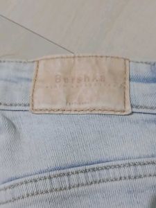 BERSHKA -Light Wash Blue Flared Jeans