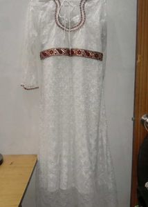 Elegant White Lace Gown with Red Trim