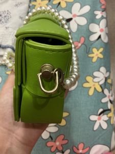 Vibrant Green Woven Clutch Bag with Pearl Strap
