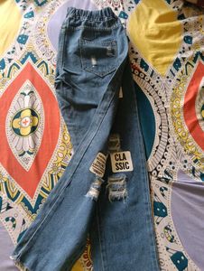 Distressed Blue Denim Jeans