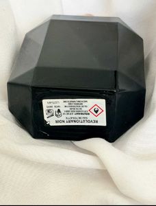 Revolution  Perfume Bottle,HALF USED,FIXED PRICE