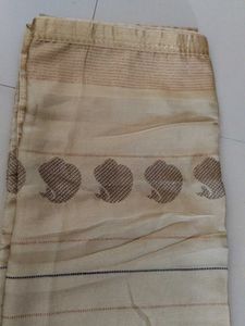Elegant Beige Saree with Subtle Motifs