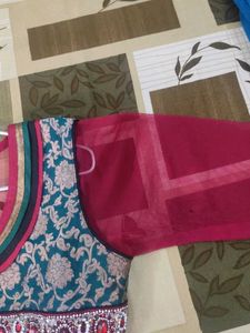red suit with  black churidar and dupatta