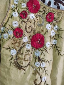 Designer Yellow Gown With Beautiful Roses Work On