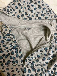 Grey Coloured Animal Print Hoodie From Zudio.