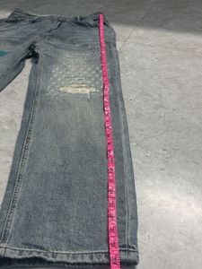 Distressed Patchwork Denim Jeans