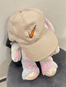 Cap with hair attached