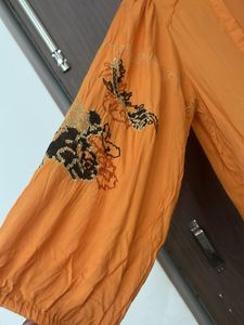 Orange Embroidered designer top