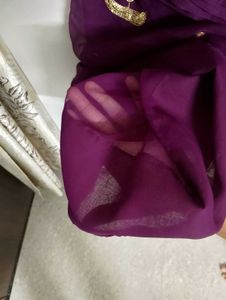 Elegant Purple Saree with Gold Embellishments