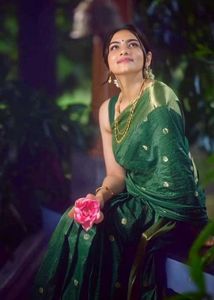Elegant Green Saree with Gold Border