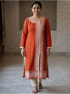 Elegant Orange Kurta with Intricate Embroidery