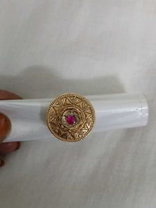 Elegant Gold Ring with Ruby Accent