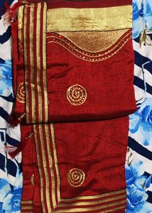 Elegant Red Silk Saree with Gold Embellishments