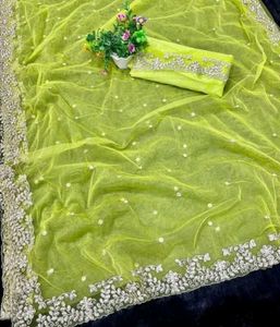 Stunning Yellow Embellished Net Saree