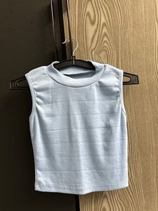 Light Blue Sleeveless Mock Neck Top