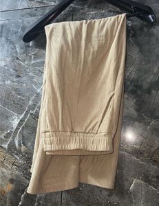 Black &amp; White Crop Top with Beige Wide-Leg Pants