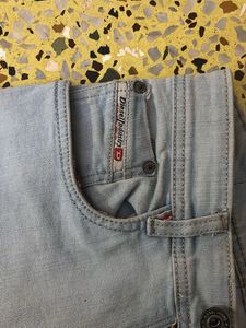 Light Wash Distressed Denim Jeans